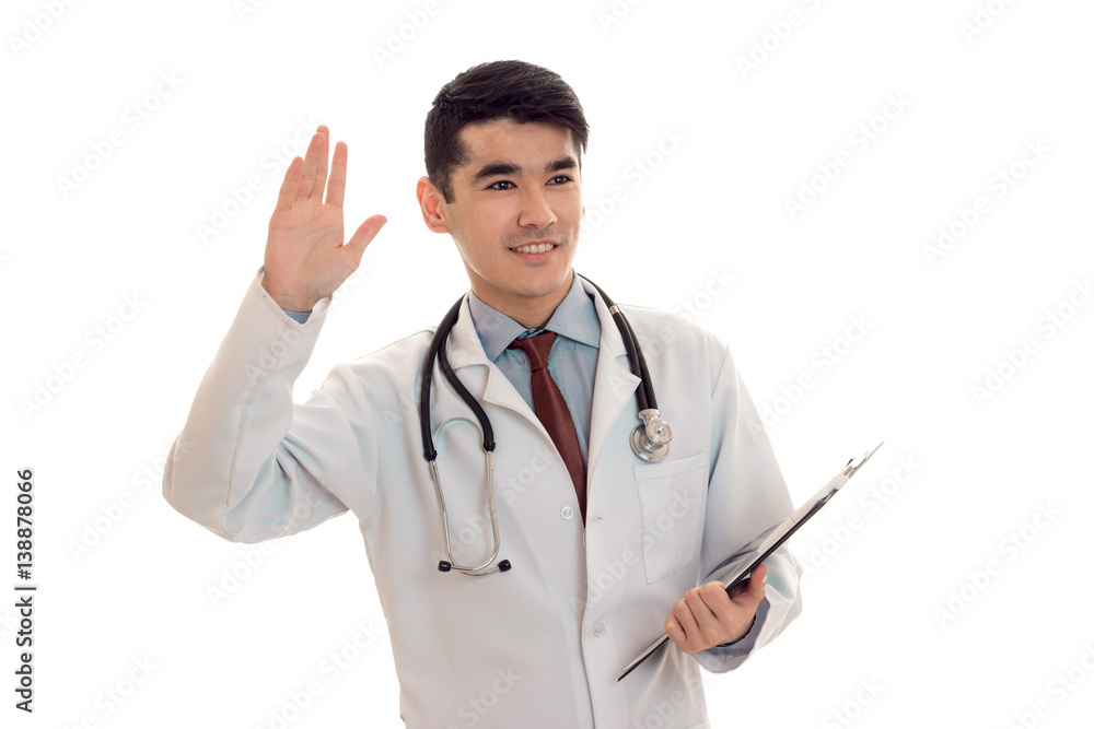 young cute doctor in blue uniform with stethoscope on his neck isolated on white background young cute doctor in blue uniform with stethoscope on his neck isolated on white background