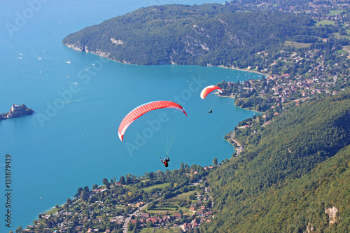 Paragliders above Lake Annecy