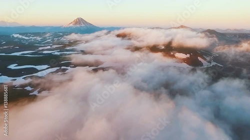 Aerial View. Aircraft flies through clouds. Amazing view.