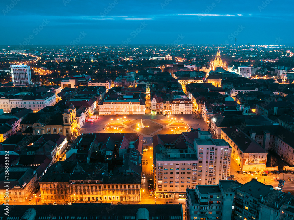 Nightscape of european city Timisoara seen from above by a drone at blue hour