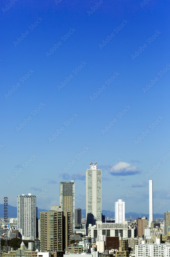 東京都市風景　池袋　高層ビル群　サンシャイン　快晴　青空　コピースペース