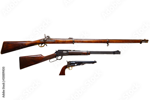 Fotografía Classic American weapons on white background: Civil war rifle, Wild West rifle a