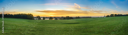 Panorama of Willen Lakeside Park in Milton Keynes at sunrise, UK