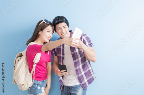 young couple selfie happily