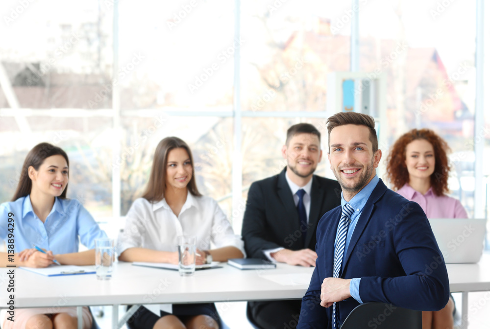 Job interview concept. Human resources commission interviewing man