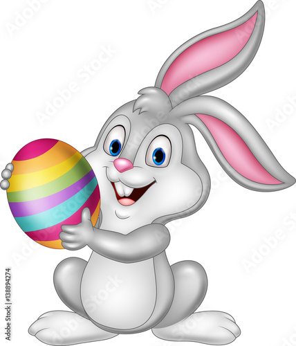 Cartoon little bunny holding Easter egg