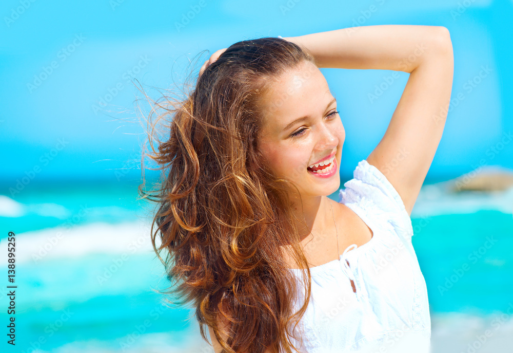 Beauty young healthy woman enjoying vacation over ocean background. Caribbean holidays