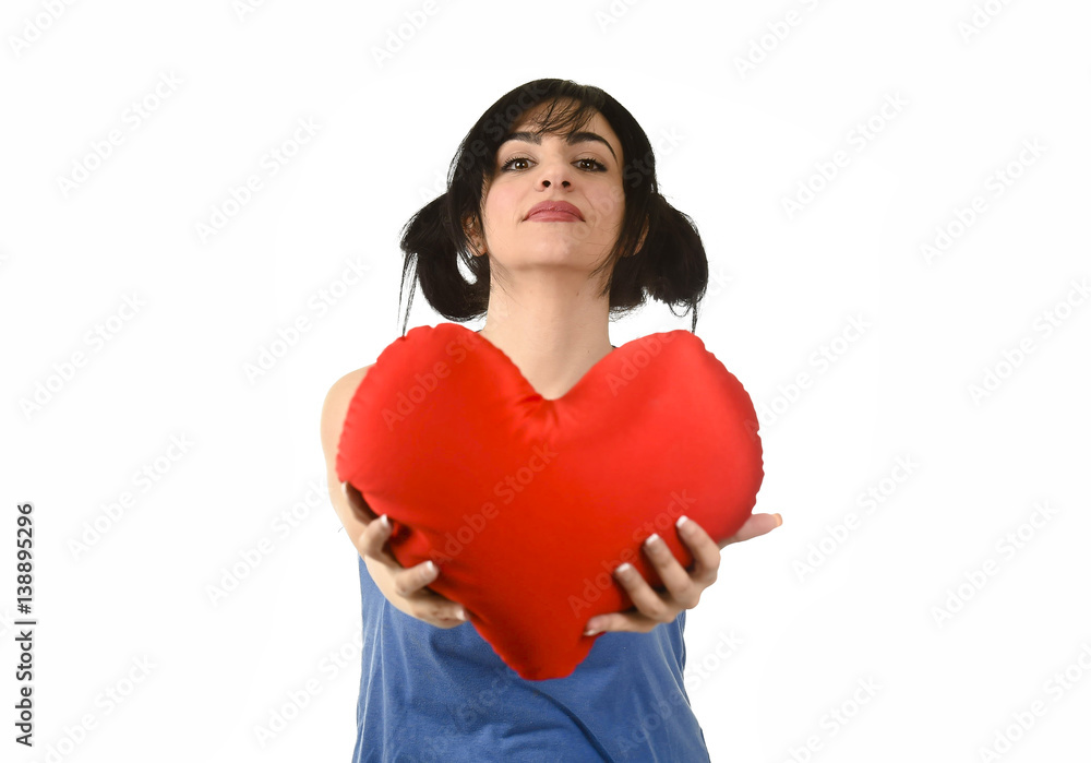 beautiful woman smiling happy feeling in love holding red heart shape pillow beautiful woman smiling happy feeling in love holding red heart shape pillow