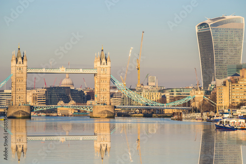 Tower Bridge and London cityscape viewed from across river Thames, UK photo