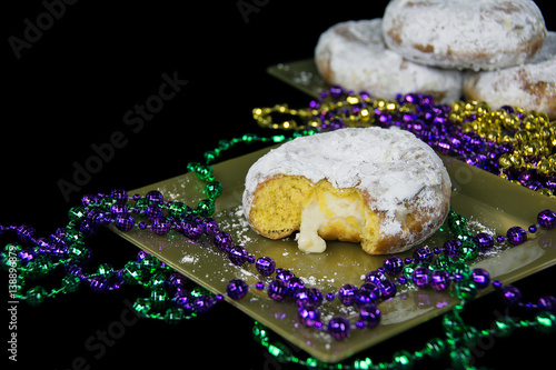 Bavarian cream in Fat Tuesday paczki with party beads