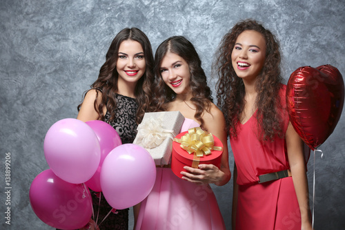 Beautiful young women at bi...