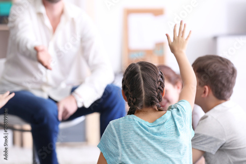 Male teacher conducting lesson at school