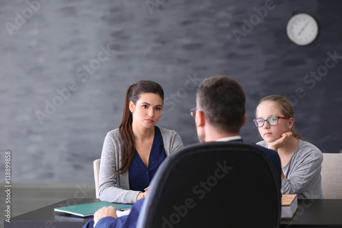 Young woman with daughter d...