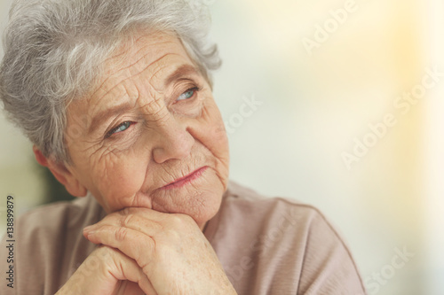 Fototapeta Depressed elderly woman at home
