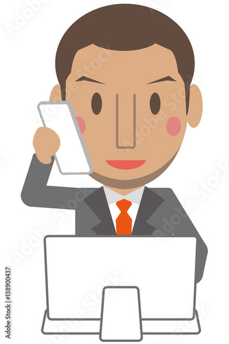 かわいいアフリカ系男性　グレーのスーツのビジネスマン　短髪　パソコン