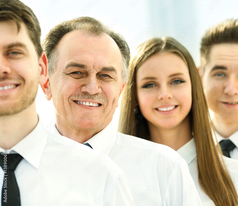 successful business team on a background of bright, modern office successful business team on a background of bright, modern office