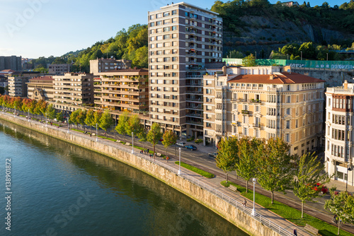 View from the famous bridge Salbeko Zubia, to the Deusto and Uribarri districts of Bilbao and the Nervion river that runs through the city into the Cantabrian Sea photo