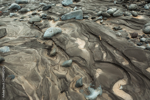 IL and stones on bottom of river Studenaya. Kamchatka Peninsula. photo