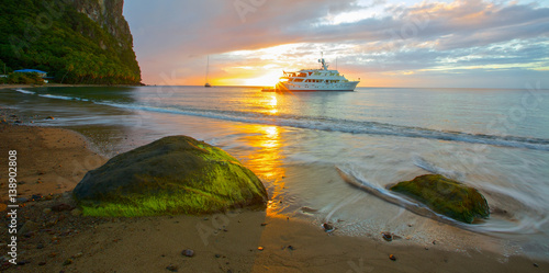 Sunset ting behind the yacht st Lucia