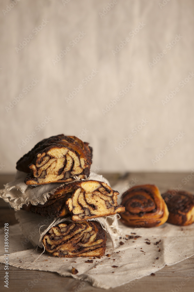 Rustic Chocolate Krantz Cake on Wooden Table Rustic Chocolate Krantz Cake on Wooden Table