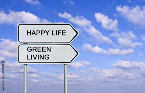 Road sign to happy life and green living © Dmitry