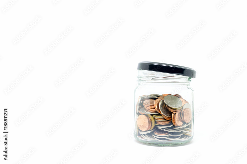coin in glass bottle on white background coin in glass bottle on white background