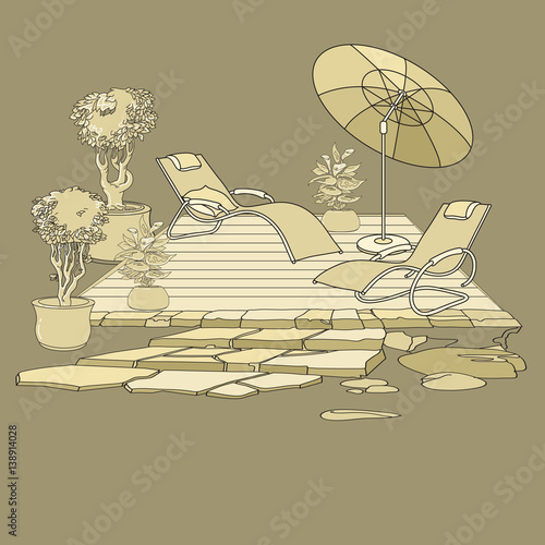 Lounge chairs under patio umbrella and flowers in pot.