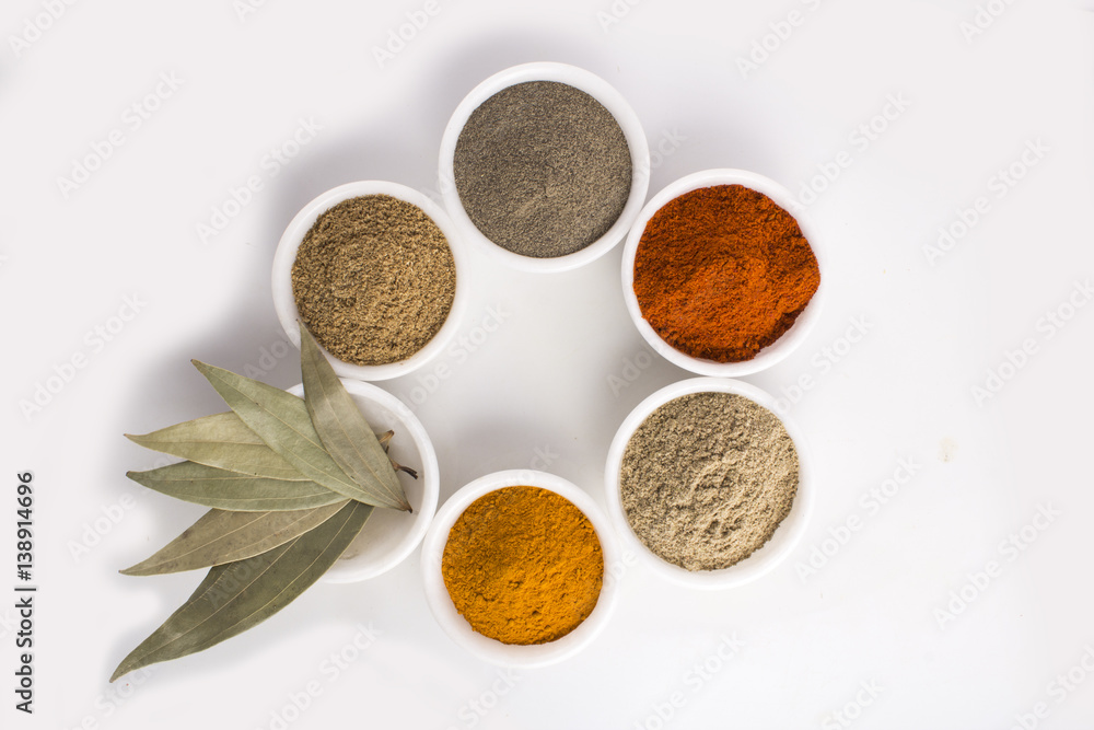Spices in Bowl on white background Spices in Bowl on white background