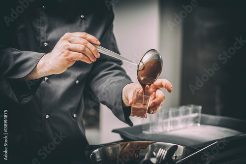 Chef preparing chocolate mousse