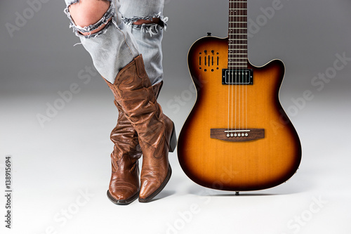 Legs in Jeans and Cowboys Boots
