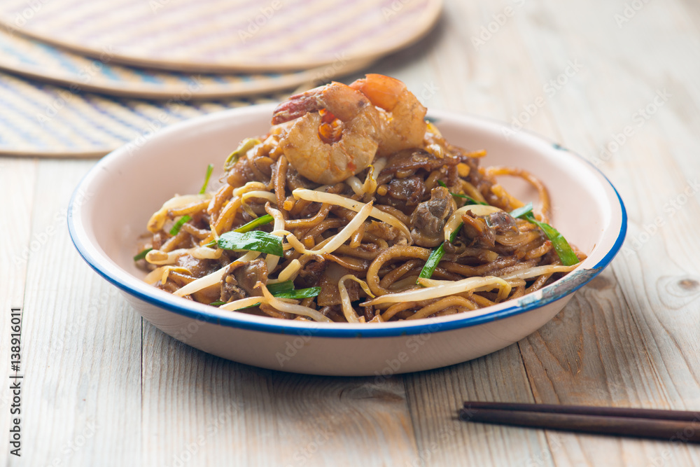 Fried Penang Char Kuey Teow, popular fried noodle in malaysia Fried Penang Char Kuey Teow, popular fried noodle in malaysia