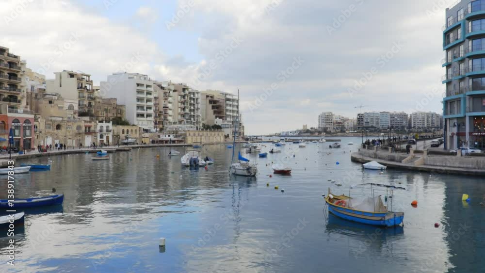 picturesque view of the canal with moored boats picturesque view of the canal with moored boats