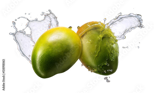 Water splash and fruits isolated on white backgroud. Fresh mango