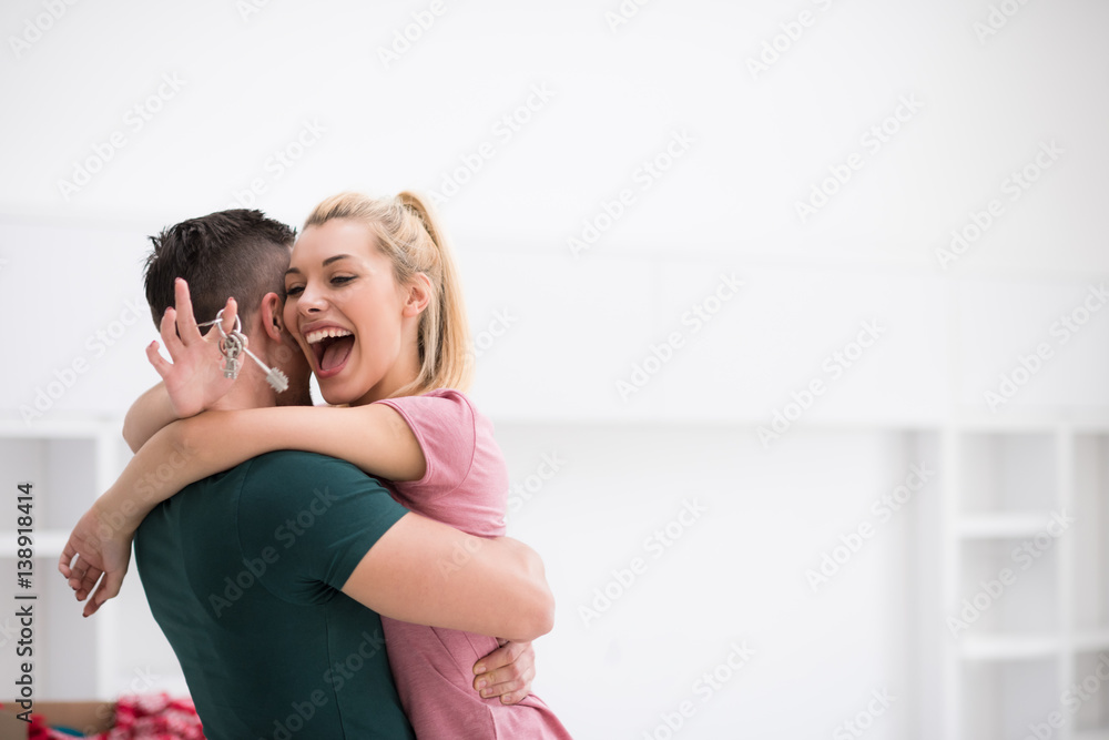 happy Young couple moving in new house happy Young couple moving in new house