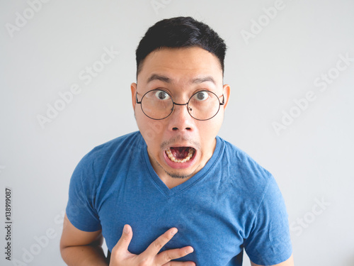 Quadro su tela Funny face of shocked Asian man.