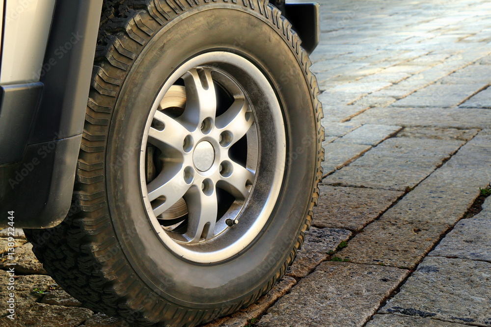 Wheel of the off-road car close-up