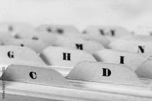 Close up of alphabetical index cards in box