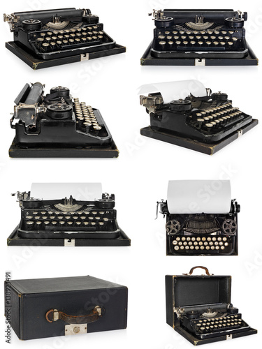 Old antique vintage portable typewriter, with a blank sheet of paper.