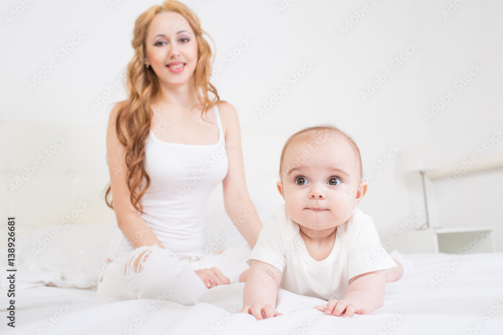 Mother playing with baby. Mother playing with baby.