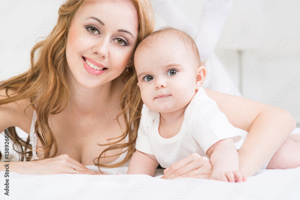 Mother playing with baby. Mother playing with baby.