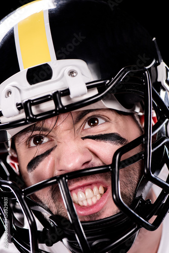 Close-up view of angry man american football player in helmet looking away © LIGHTFIELD STUDIOS