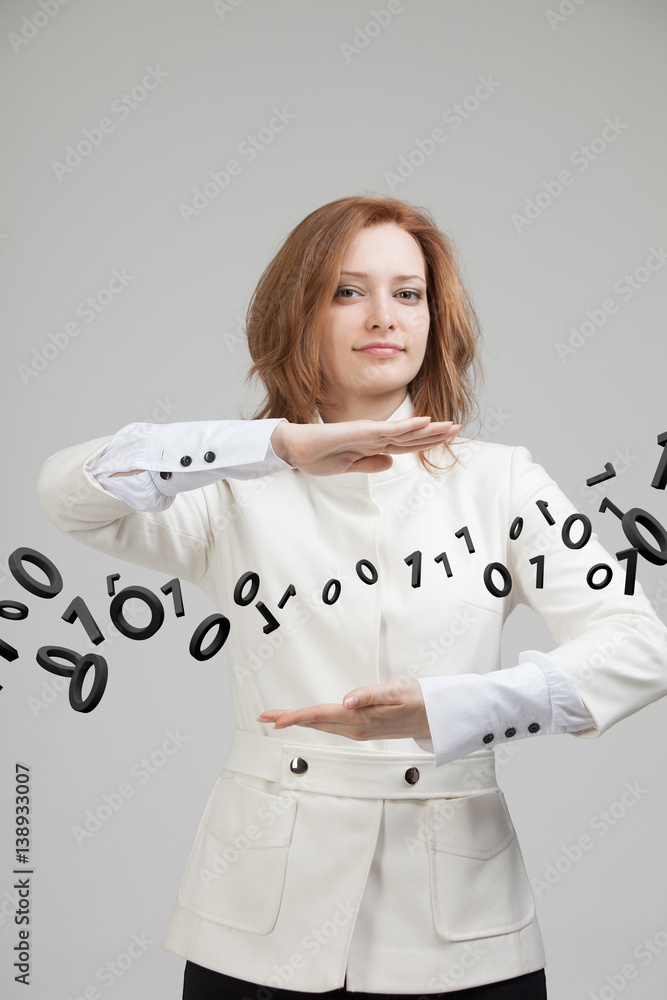 Woman working with binary code, concept of digital technology. Woman working with binary code, concept of digital technology.