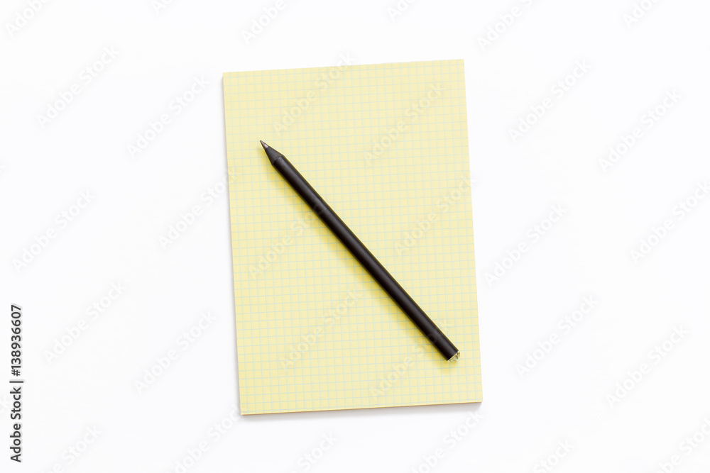 yellow Notepad and pencil on white background. yellow Notepad and pencil on white background.