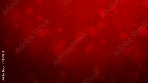 Abstract red background with floating particles. Seamlessly loopable animation.