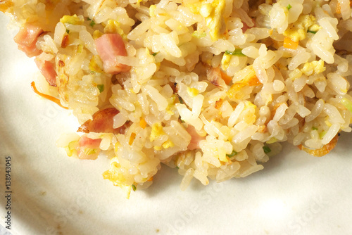 Yakimeshi - Japanese pan fried rice with bacon, egg, and vegetable photo