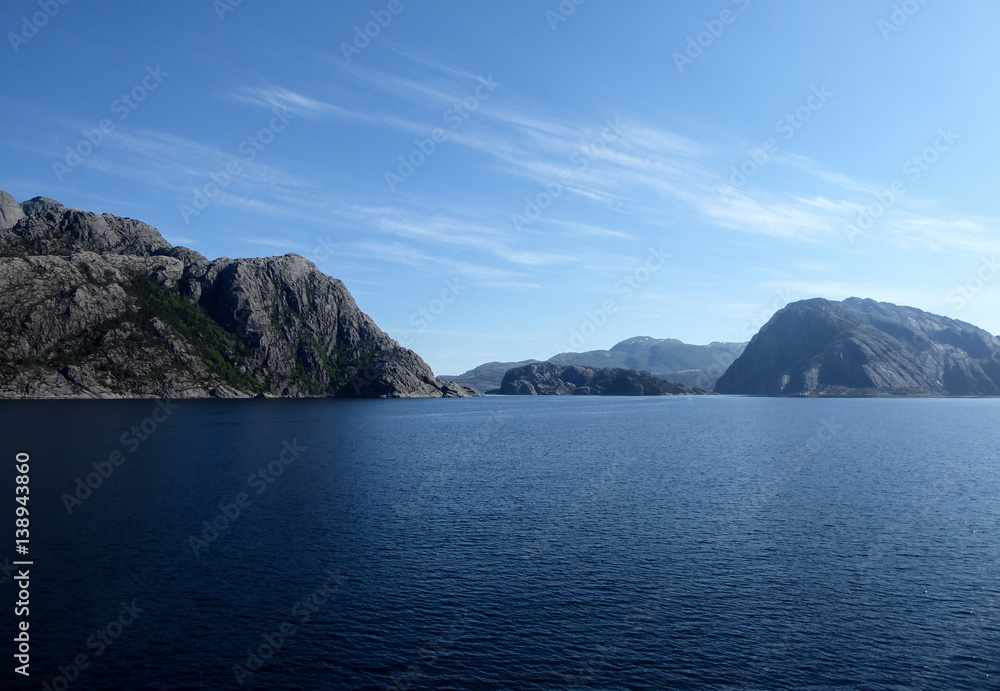 Stunning view of fjords and mountainous landscape on sunny day