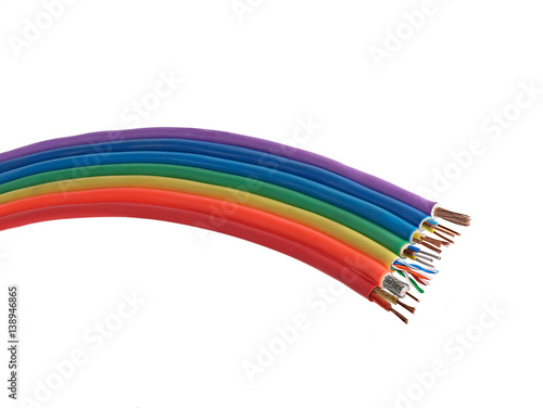 electric wires and cables in multi-colored shell in the form of a rainbow