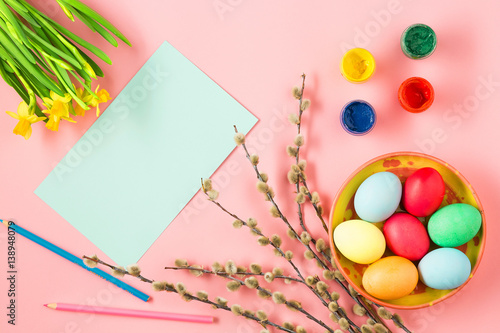 Canvas Print The top view of easter on pink table office workplace