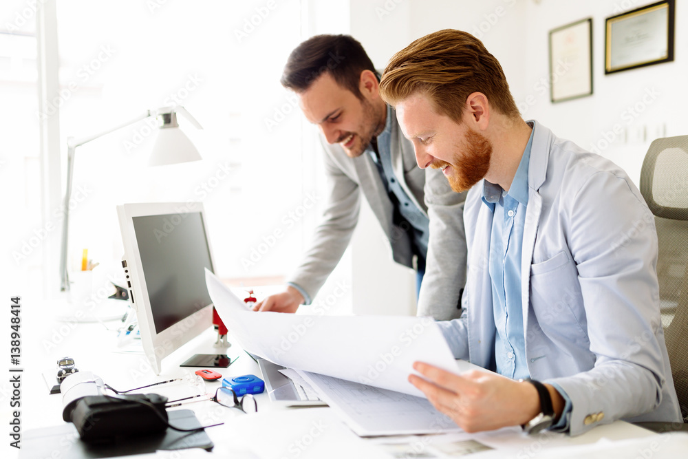 Coworkers working on project together Coworkers working on project together