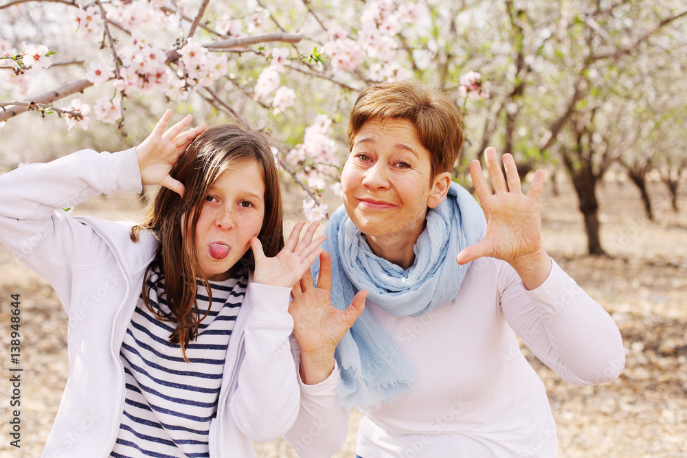 Happy mother and daughter outdoors. Mother day. Happy mother and daughter outdoors. Mother day.
